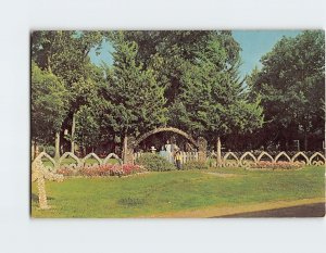 Postcard Rock fence and entrance, Greetings From Rockome Gardens, Arcola, IL