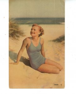 Swimming/Bathing - Swimsuit Model in the Sand  (creases)