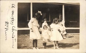 Little Girls at Home Garrison Cancel - Mailed to Chicago Illinois RPPC