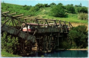 M-101806 Glamor Tran Crosses Collapsing Bridge Universal Studios California