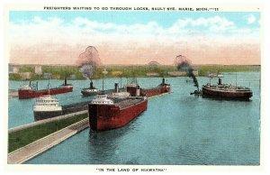 Freighters Waiting Locks Sault Ste Marie Land of Hiawatha Michigan Postcard