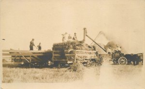 Postcard RPPC Farm harvest equipment workers C-1910