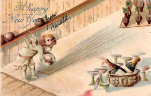 New Year Greetings Angel Cupid Bowling Champagne Vintage Postcard AA21092