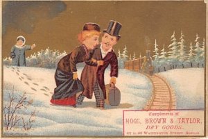 Approx. Size: 3 x 4.25 Man and woman walking through the snow to the train  L...