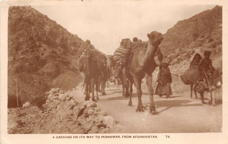 Lot142 real photo pakisan a caravan on way to peshawar from afganistan camel