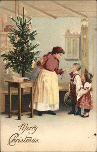 Mother and Children Decorate Christmas Tree Pre-1910 Vintage Postcard