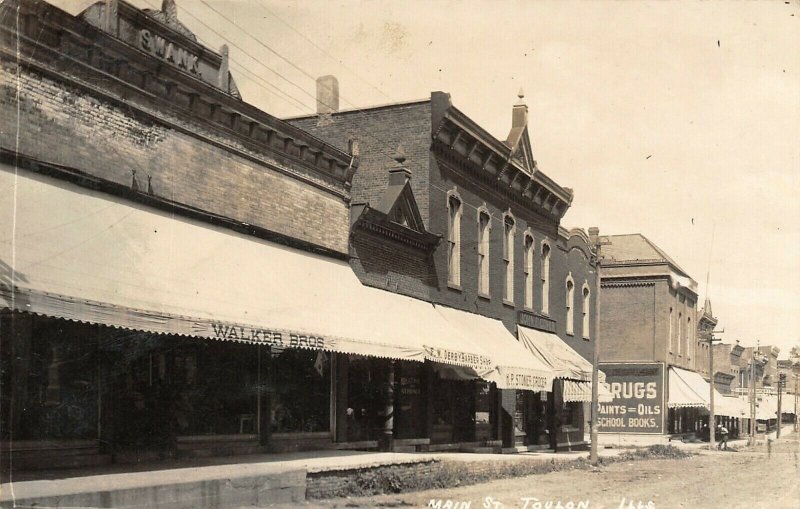 Toulon IL Swank Bldg~Derby Barber Shop~Grocer Stonier~Model Bakery~RPPC c1907 