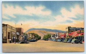 CODY, WY Wyoming ~ MAIN STREET Scene 1930s Cars Park County  Postcard