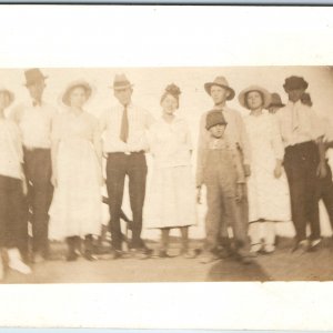 c1910s Large Group Family Outdoors RPPC Hat Women Smile Boys Girls Photo A283