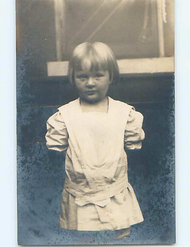 Pre-1909 rppc CUTE GIRL WITH HANDS BEHIND HER BACK HM0413