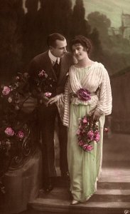 c1910 ROMANTIC COUPLE ROSES STUDIO BACKDROP TINTED PHOTO RPPC POSTCARD P1364