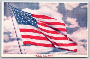 US Flag~Old Glory Stars & Stripes Flying W/ Sky Background~Vintage Postcard