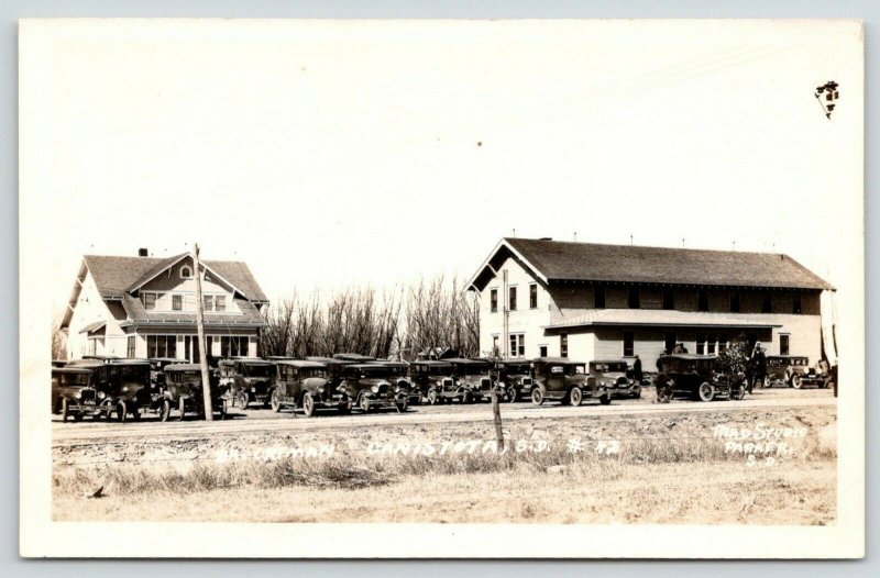 Canistota SD~Dr Ortman Clinic & House~Full Vintage Car Parking Lot~1930s RPPC 