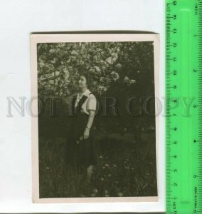 452369 USSR 1960 year girl near a flowering tree Old photo
