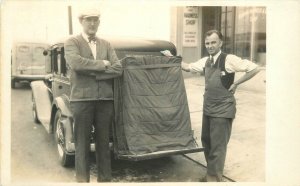 RPPC Postcard 1930s Auto Luggage attachment Men harness Shop 23-7512