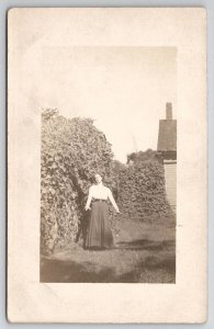 RPPC Pretty Edwardian Woman Stiking Pose In Garden Postcard R25