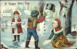 New Year - Children Ice Skating Building Snowman c1910 Postcard
