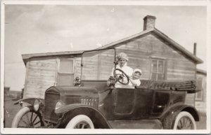 Woman and Child in early Car Automobile Moosomin SK Saskatchewan RP Postcard H60