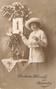 Lady with calendar sheet. Toasting Old vintage German postcard