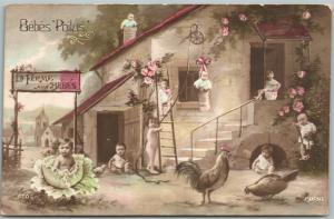 MULTIPLE BABIES FARM ANTIQUE POSTCARD