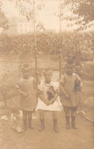 Children with Toys Rope Swing Real Photo Vintage Postcard AA70979