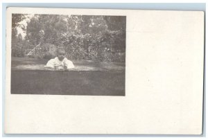 1907 Candid Baby Garden Flowers Baltimore MD RPPC Photo Posted Postcard