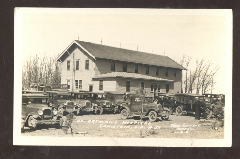 RPPC CANISTOTA SOUTH DAKOTA DR ORTMAN'S HOSPITAL OLD CARS REAL PHOTO POSTCARD