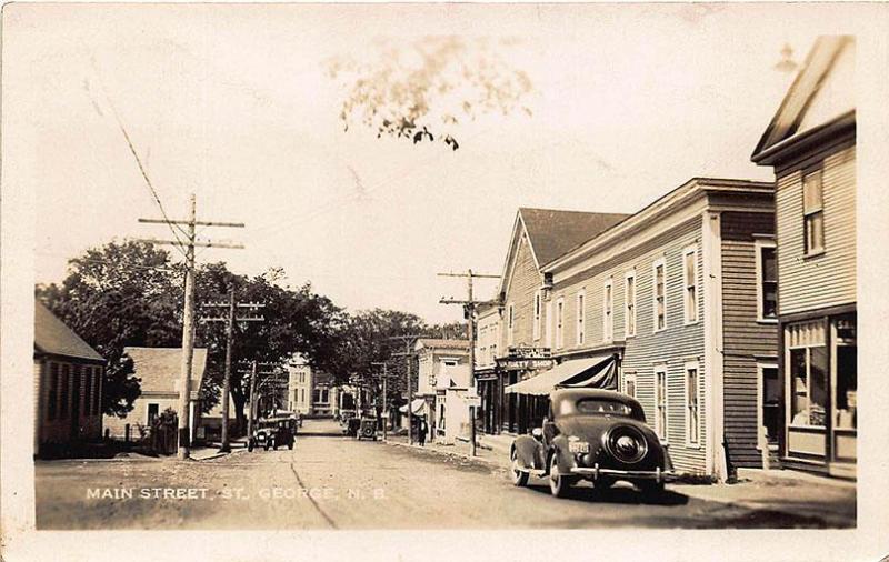 St George N. B. Canada Main Street Storefronts Old Cars RPPC Postcard