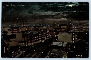 1910 Winnipeg Manitoba Canada Postcard Main Street Night Moon Exterior Building