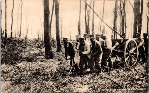 Postcard WWI  - Infantry helping move the new rifle stand