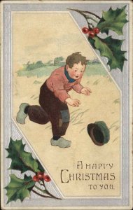 Christmas Cute Dutch Boy Chasing Hat c1910 Vintage Postcard