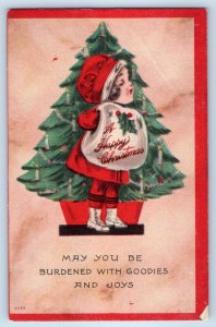 c1910's Christmas Child Girl With Handwarmer Decorated Christmas Tree Postcard