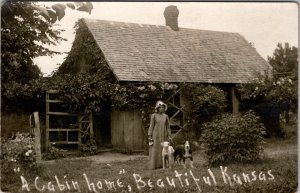Sabetha Kansas Cabin Home Women Prairie Bonnet Dogs RPPC Postcard A23