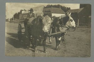 Gary SOUTH DAKOTA RPPC 1909 COW CART Wagon MAIN STREET nr Clear Lake Watertown