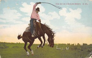 Cowboy on a Bucking Bronco Unused image wear on front