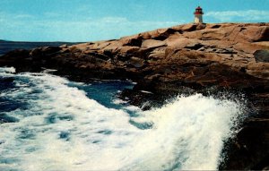 Canada Nova Scotia Surf At Peggy's Cove Showing Lighthouse