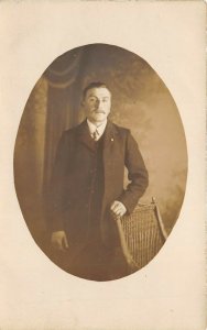 1910s RPPC Real Photo Postcard Fashion Well Dressed Man Overcoat Suit Chair