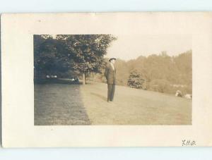 1911 rppc MAN IN SUIT LOOKING DOWN THE HILL Postmarked Washington DC HM2643