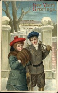 New Year Children Boy and Girl With Ice Skates c1910 Vintage Postcard