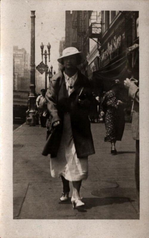 RPPC Real Photo Postcard - Lady Walking the City Streets