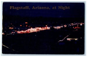 c1950's Bright Lights At Night Hotels Restaurant Flagstaff Arizona AZ Postcard
