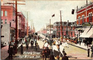Postcard ON Fort William Victoria Street Clothing Store March Band ~1910 S97