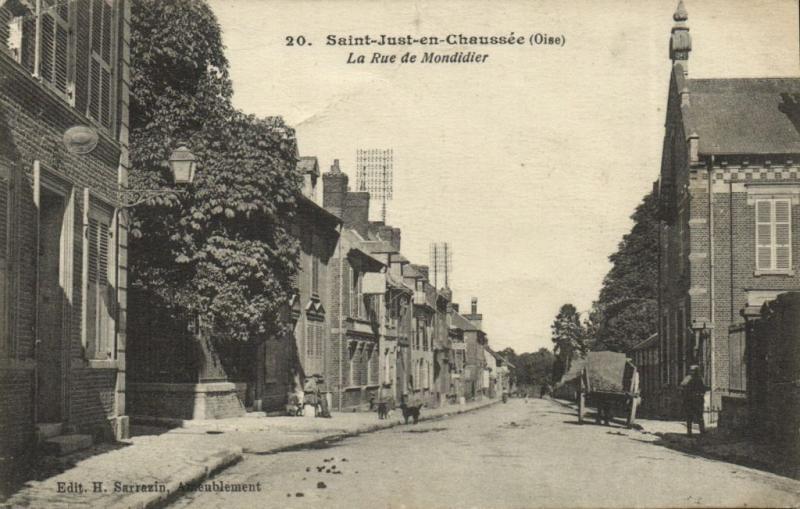 CPA St-JUST-en-CHAUSSÉE La Rue de Mondider (130617)