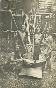 indonesia, BORNEO, Topless Dayak Women Pounding Rice (1910s) RPPC Postcard