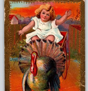 Thanksgiving Postcard Girl Riding Turkey Cart Embossed Fantasy Many CREASES