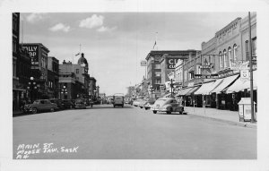 J80/ Moose Jaw Sask. Canada RPPC Postcard c1940s Main Street Stores 13