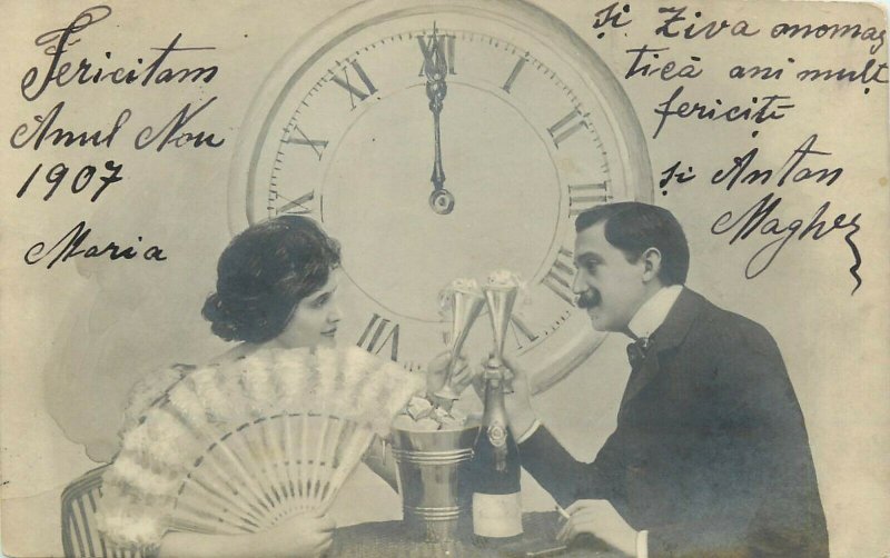 Fancy couple New Year champagne cheers clock lady fan 1907 postcard