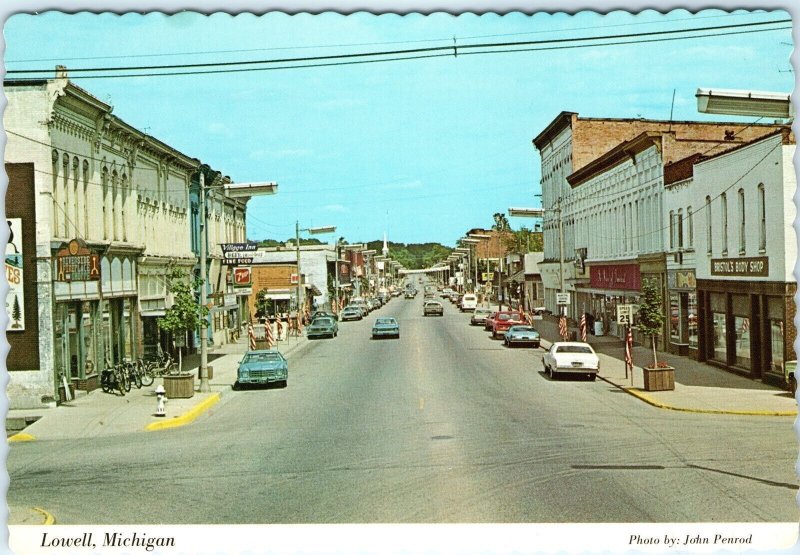 c1980s Lowell, Mich. Downtown Main St Cars 7up Sign Postcard Penrod Photo MI A79