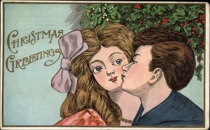 Christmas - Art Deco Boy Kisses Girl c1910 Postcard