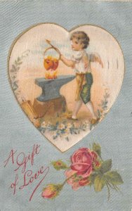 VALENTINE HOLIDAY ANGEL CUPID HEARTS FORGE A GIFT OF LOVE EMBOSSED POSTCARD 1908